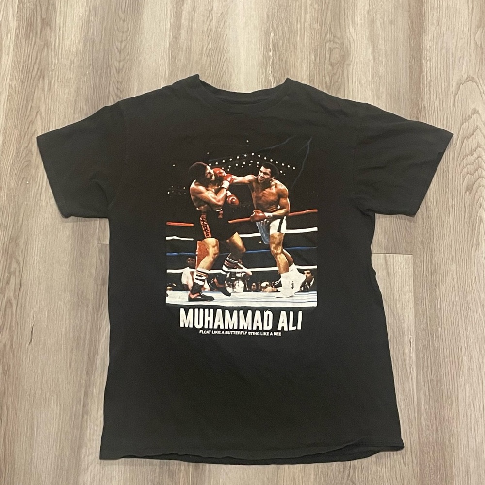 Muhammad Ali black, medium size shirt.